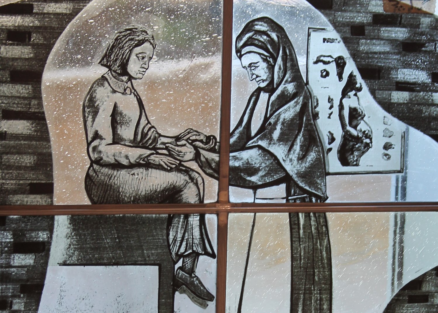 An image in an art glass window in the hospital chapel represents one of the many sisters who founded the hospital and treated patients there for many decades.